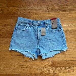 Levi’s 501 distressed mini denim shorts